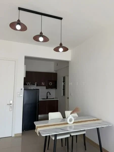 Dining features: 3-bulb pendant light fixture, white dining table, black metal legs on dining table, decorative vase on table, striped table runner, brown cabinetry, black refrigerator, kitchen countertop visible, cream painted walls, tile flooring; style: modern.