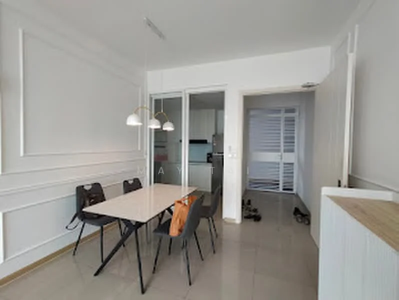 Dining features: white painted walls, tile flooring, dining table with white surface, 4 black dining chairs, pendant lighting with three bulbs, glass sliding door, open layout to kitchen, decorative wall paneling; style: modern. Room features: white painted walls, tile flooring, doorway leading to another room, shoes on the floor.