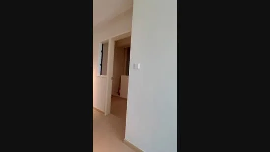 Room features: white painted walls, light-colored flooring, doorway leading to another room, window with grid design, neutral color scheme; style: modern.