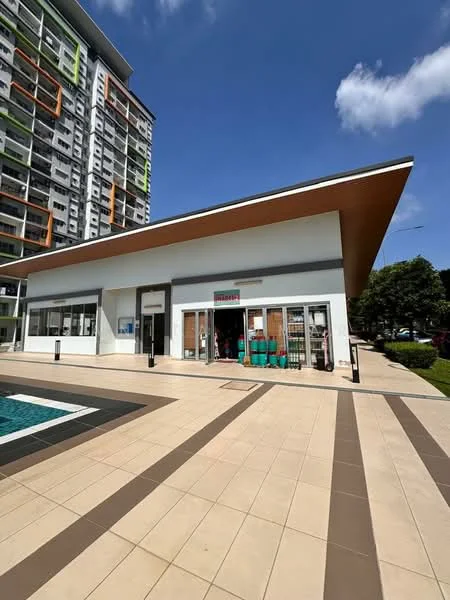 Exterior type: clubhouse; features: white painted facade, flat roof, large glass windows, outdoor seating area, manicured landscaping, paved walkway, surrounded by greenery, swimming pool adjacent; style: modern.