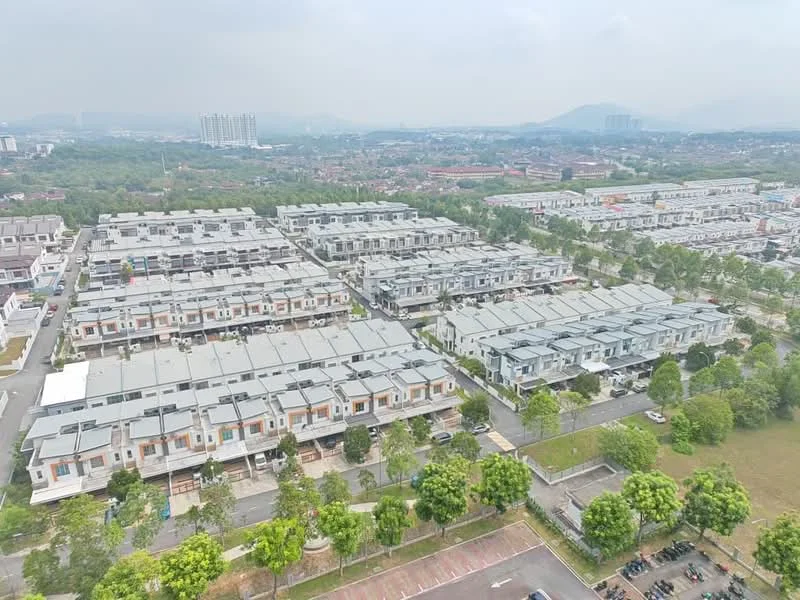 Exterior type: linked terrace house; features: multiple rows of linked terrace houses, flat roofs, manicured lawns, paved driveways, surrounding greenery, open-air parking lot, urban landscape in background, mountain view in distance; style: modern.