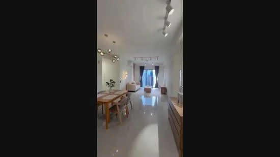Living features: white painted walls, polished tile flooring, recessed downlights, track lighting, floor-to-ceiling windows, sheer curtains, sofa in light color, dining table with chairs, wooden sideboard, decorative plants; style: modern; view: city.
