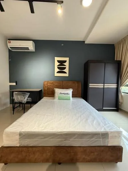 Bedroom features: queen-size bed with upholstered headboard, white bedding, study desk with transparent chair, built-in wardrobe with sliding doors, wall-mounted air conditioning unit, cream curtains, grey accent wall, tile flooring, recessed ceiling lights; style: modern.