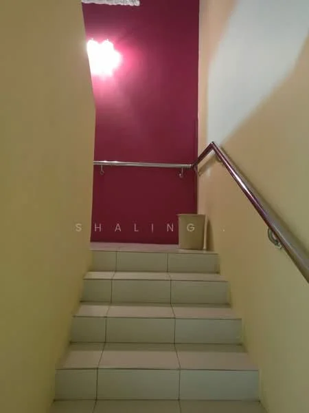 Room features: staircase with tiled flooring, handrail, pink accent wall, cream painted walls, ceiling light fixture.