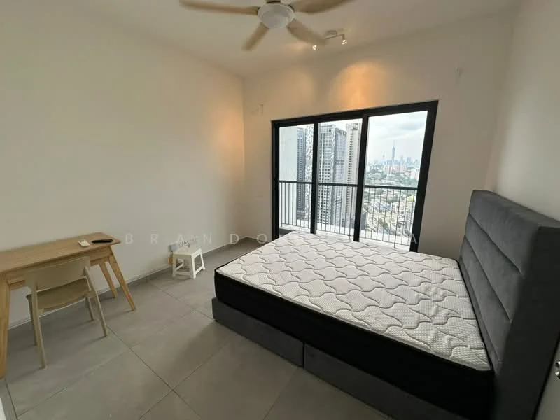 Bedroom features: grey upholstered bed frame, queen-size bed, white walls, grey tile flooring, 5-blade ceiling fan with light, floor-to-ceiling windows, black metal window frames, desk with chair, city skyline view, no bedding on bed; style: modern; view: city.