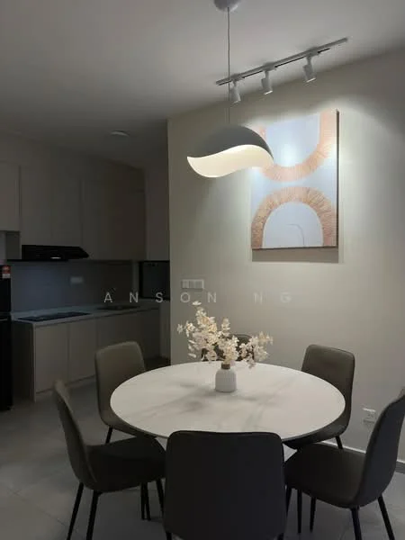 Dining features: round dining table with marble top, 4 upholstered dining chairs in grey, pendant lamp with curved design, framed artwork on wall, light grey painted walls, tile flooring, built-in kitchen cabinetry visible in background, black refrigerator visible in background; style: modern.