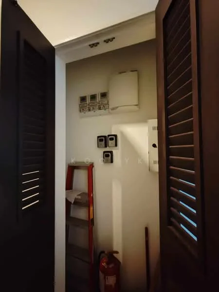 Room features: white painted walls, sliding louvered doors, electrical meter box, fire extinguisher, ladder, utility storage, wall-mounted electrical panel, multiple electrical switches.