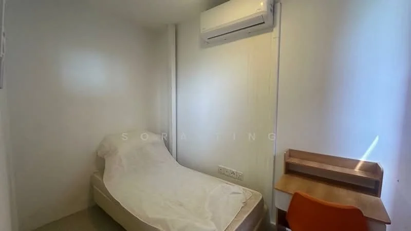Bedroom features: single bed, wall-mounted air conditioning unit, wooden study desk, orange chair, white painted walls, laminate flooring, natural light from window; style: minimalist.