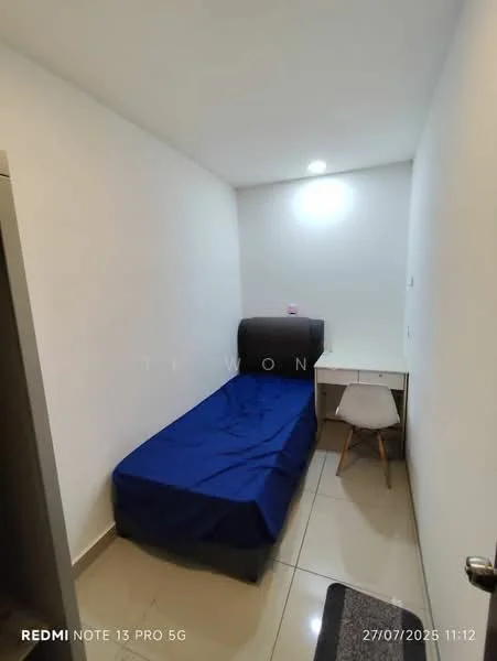 Bedroom features: single bed with blue bedding, white painted walls, tile flooring, desk with chair, wall-mounted light fixture, window with no visible treatment, built-in wardrobe, neutral color scheme; style: minimalist.
