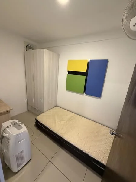 Bedroom features: single bed mattress, wooden wardrobe, decorative wall art in green, yellow, and blue, tile flooring, ceiling fan, air conditioning unit, neutral painted walls, wooden bedside table; style: modern.