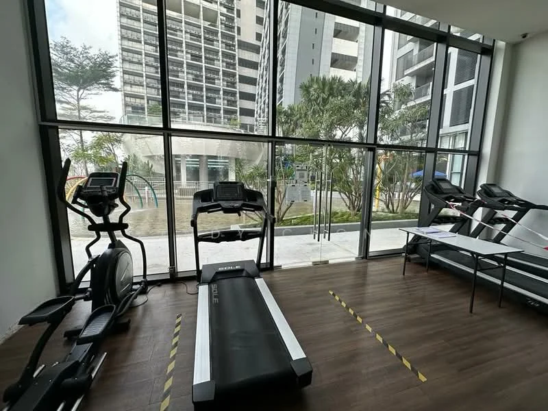 Room features: large floor-to-ceiling windows, wood laminate flooring, treadmill, elliptical machine, exercise equipment, outdoor view, safety markings on floor, indoor plants; style: modern; view: garden.