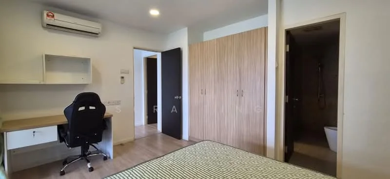 Bedroom features: wooden flooring, white painted walls, 1 wall-mounted split AC, desk with chair, built-in wardrobe with sliding doors, door leading to bathroom, window with no visible treatment, queen-size bed with patterned bedding; style: modern.