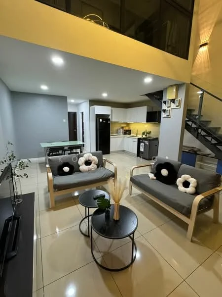 Living features: grey fabric sofa with floral cushions, black coffee table, ceramic vase with decorative plant, wall-mounted TV, tile flooring, recessed LED downlights, open-plan layout with kitchen visible, staircase with metal railing, neutral painted walls, large windows for natural light; style: modern. Kitchen features: white cabinetry, black refrigerator, stainless-steel sink, built-in oven, 4-burner gas hob, countertop with space for food preparation, tile backsplash, open layout to living area; style: modern.