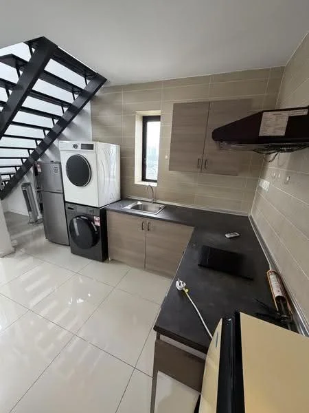 Kitchen features: grey cabinetry, black countertop, single-bowl stainless-steel sink, chrome pull-down faucet, built-in oven, freestanding fridge, front-load washing machine, ceramic tile flooring, white painted walls, exposed staircase, window with city view, range hood; style: modern; view: city.