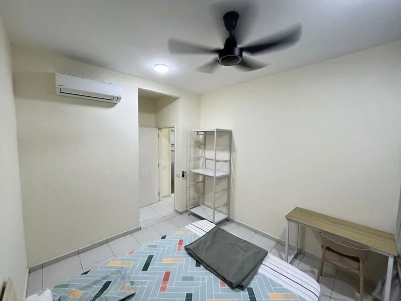 Bedroom features: white painted walls, tile flooring, 5-blade ceiling fan with light, wall-mounted split AC, single bed with patterned bedding, wooden study desk, plastic chair, open shelving unit, window with curtain; style: modern.