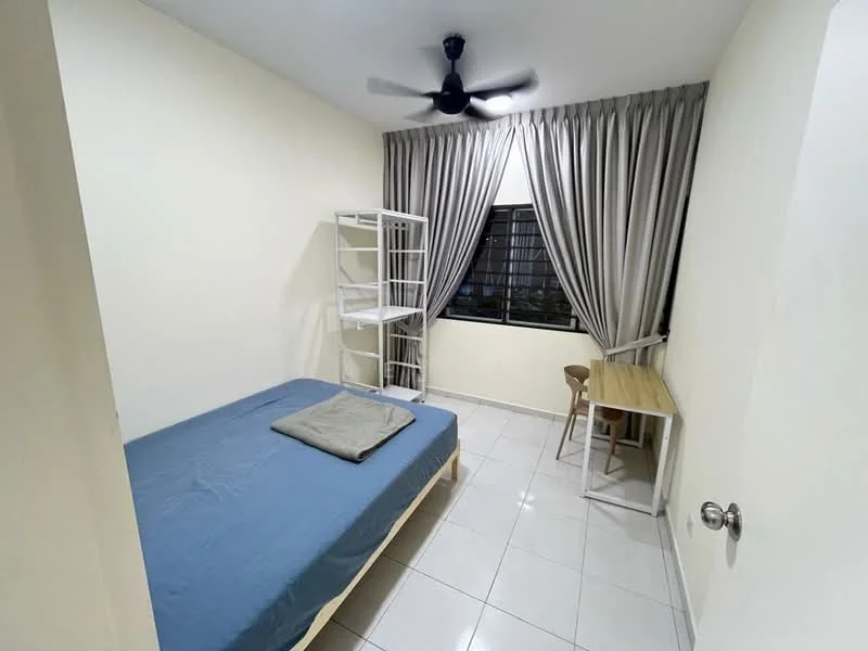 Bedroom features: single bed with blue bedding, white bed frame, ceiling fan with light, white tiled flooring, light grey curtains, window with view to outside, white shelving unit, wooden study table, wooden chair, neutral painted walls; style: modern.