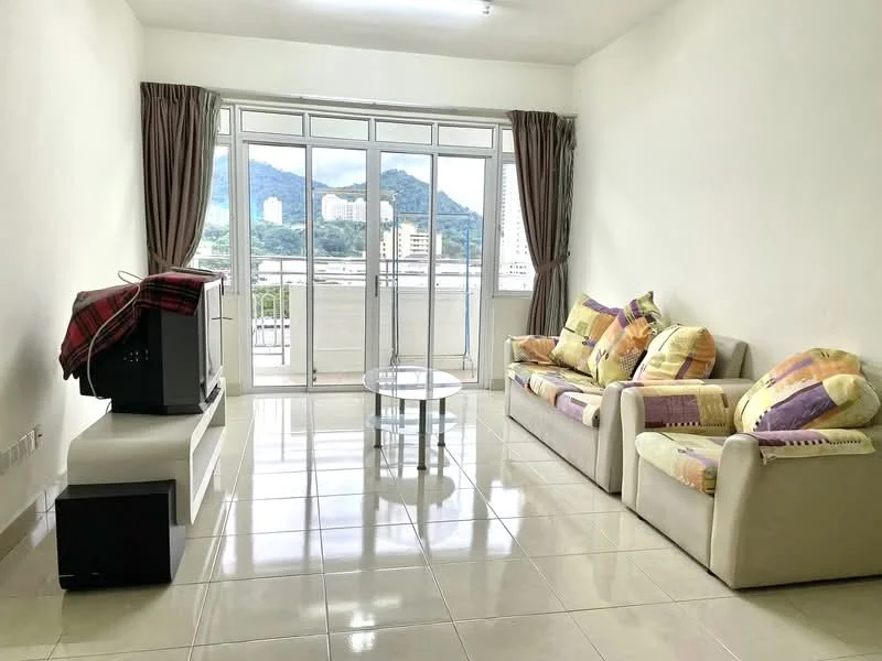 Living features: white painted walls, glossy tile flooring, floor-to-ceiling windows, curtains in brown, 3-seater fabric sofa in beige with colorful cushions, coffee table with glass top, TV console, wall-mounted TV, decorative throw blanket on sofa; style: modern; view: mountain.