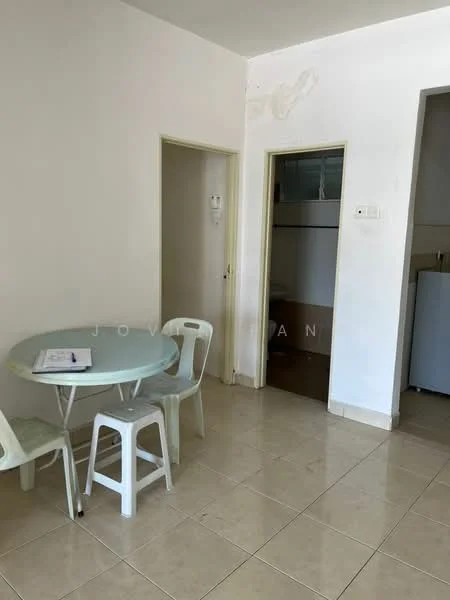Room features: white painted walls, cream tiled flooring, round dining table, 3 plastic chairs, doorway leading to another room, doorway leading to kitchen area, refrigerator visible in background; style: minimalist.