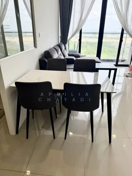 Dining features: white marble dining table, 4 black dining chairs, floor-to-ceiling windows, sheer curtains, grey fabric sofa, polished tile flooring, view of greenery, contemporary decor; style: modern; view: garden.