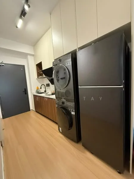 Laundry features: black front-load washing machine, black dryer, stainless-steel sink, black refrigerator, wood cabinetry, white countertop, light wood flooring, recessed LED downlights; style: modern.