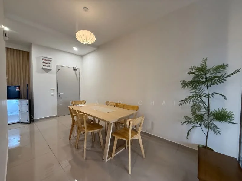 Dining features: wooden dining table, 4 wooden dining chairs, white painted walls, grey tiled flooring, pendant light fixture, indoor plant in ceramic pot, door leading to hallway, refrigerator visible in background; style: modern.