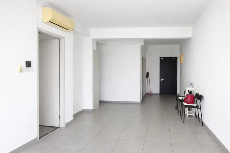 Room features: white painted walls, grey floor tiles, 1 wall-mounted split AC, doorway to adjacent room, black door, 2 wooden chairs, small table, light-colored ceiling, no visible decor; style: minimalist.
