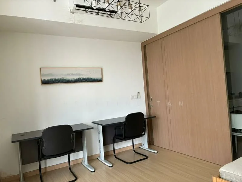 Study features: two study desks, black office chairs, wooden flooring, white painted walls, built-in wardrobe with sliding doors, framed artwork on wall, ceiling light fixture; style: modern.