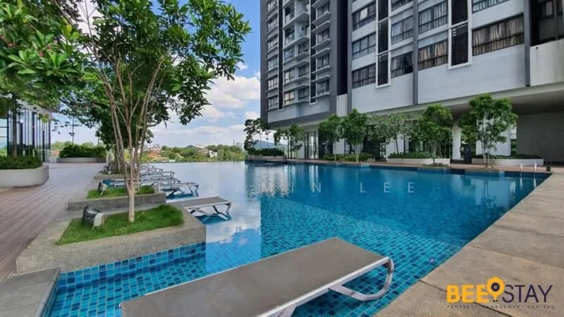Exterior type: high-rise condominium; features: infinity pool, pool deck with loungers, landscaped garden with trees, glass curtain wall facade, surrounded by greenery, water feature, outdoor seating area; style: modern.