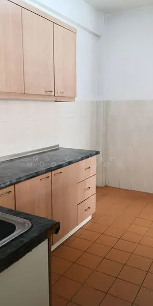 Kitchen features: laminate cabinetry in light wood, black granite countertop, single-bowl stainless-steel sink, chrome faucet, ceramic tile flooring in orange, white tiled walls, upper cabinets with handles, lower cabinets with drawers; style: modern.
