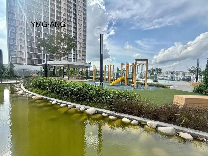 Exterior type: high-rise condominium; features: playground with slide and climbing structures, manicured lawn, landscaped garden with plants, pond with decorative stones, walking path around the pond, seating area with benches, tall trees providing shade, modern lighting poles, water feature in the pond, open space for recreational activities; style: modern.