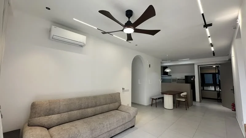 Living features: 3-seater fabric sofa in beige, ceiling fan with light, wall-mounted split AC, recessed LED downlights, white painted walls, tile flooring, dining table with chairs, open layout to kitchen, arched doorway, neutral color palette; style: modern.