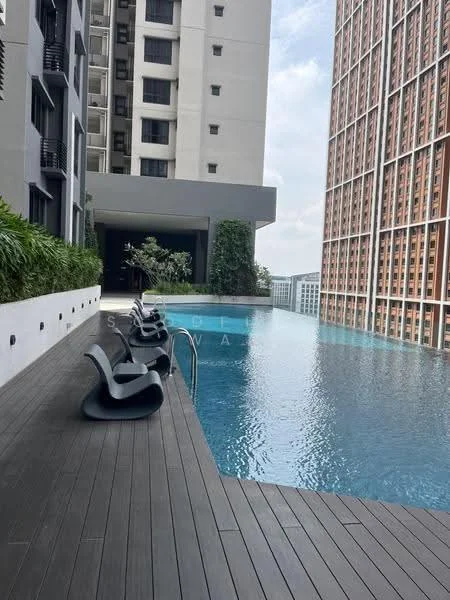 Exterior type: high-rise condominium; features: infinity pool, pool deck with loungers, wooden decking, landscaped greenery, surrounding high-rise buildings, glass railing, modern architecture; style: contemporary.