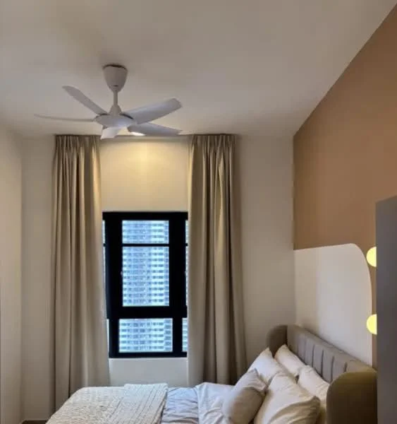 Bedroom features: king-size bed, upholstered headboard, white bedding, 2 bedside pillows, 5-blade ceiling fan, floor-to-ceiling window, blackout curtains, cream painted walls, accent wall in brown, decorative wall sconce; style: modern; view: city.