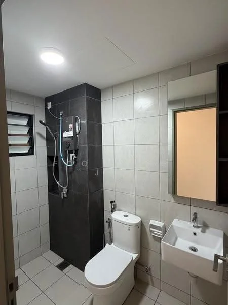 Bathroom features: white ceramic toilet, single-sink vanity with wall-mounted faucet, framed mirror, shower with handheld showerhead, grey tiled accent wall, light grey ceramic tile flooring, recessed ceiling light, window with louvered design; style: modern.