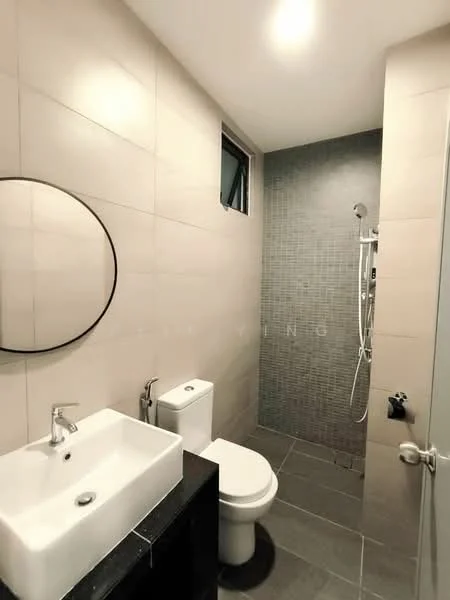 Bathroom features: white rectangular sink, chrome basin mixer faucet, black vanity cabinet, one-piece toilet, walk-in shower with glass enclosure, rain shower head, handheld shower, grey tiled walls, mosaic tile accent wall, grey floor tiles, round mirror, window for natural light; style: modern.