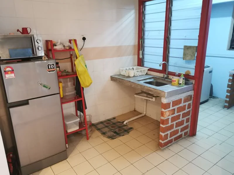 Kitchen features: stainless-steel sink, chrome pull-down faucet, grey granite countertop, brick accent wall, white tiled walls, cream ceramic tile flooring, microwave, stainless-steel fridge, open shelving, dish rack, yellow apron hanging, window with blinds; style: modern.
