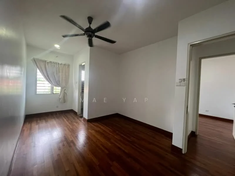 Room features: white painted walls, wooden flooring, 5-blade ceiling fan, window with grille, curtains, doorway leading to another room.