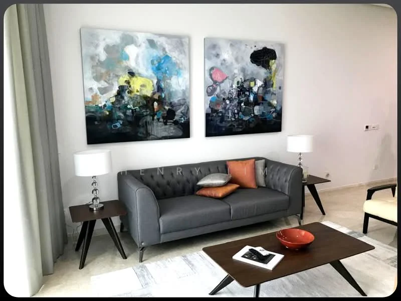 Living features: 3-seater grey fabric sofa with tufted back, 2 white table lamps on side tables, wooden coffee table, decorative orange cushion, abstract artwork on walls, light-colored area rug, floor-to-ceiling windows with sheer curtains, neutral painted walls, light-colored flooring; style: modern.
