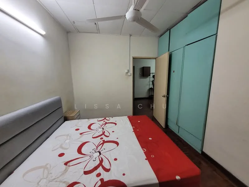 Bedroom features: queen-size bed with floral bedding, grey upholstered headboard, wooden flooring, white painted walls, ceiling fan, built-in wardrobe with sliding doors, door leading to another room, window with no visible treatment.