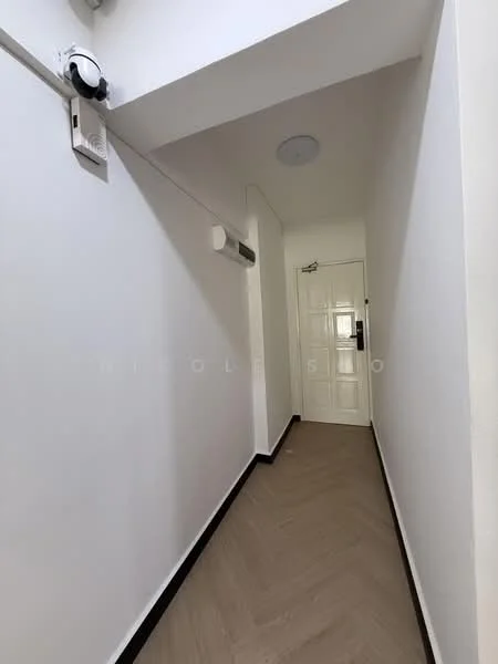 Hallway features: white painted walls, laminate flooring, ceiling light, wall-mounted air conditioning unit, security camera, white door, black baseboards; style: modern.