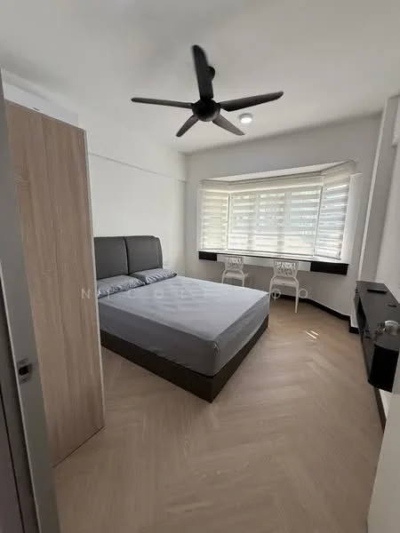 Bedroom features: queen-size bed, upholstered headboard, 2 bedside chairs, ceiling fan, wooden flooring, large windows with blinds, wall-mounted TV console, neutral wall color, built-in wardrobe; style: modern.