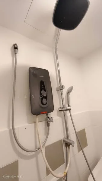 Bathroom features: shower head, wall-mounted shower mixer, water heater, chrome shower hose, white tiled walls, grey tile accents, ceiling-mounted shower arm.