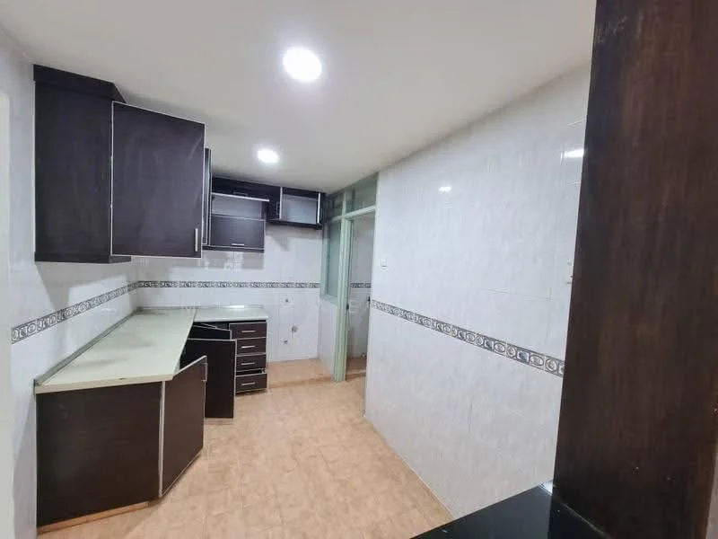 Kitchen features: dark wood cabinetry, light-colored countertop, white tiled walls, decorative tile border, vinyl flooring, recessed ceiling lights, built-in storage cabinets, open layout; style: modern.