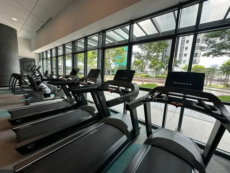 Room features: treadmills, large floor-to-ceiling windows, greenery view outside, modern fitness equipment, rubber flooring, open layout, natural light, ventilation system; style: modern; view: garden.
