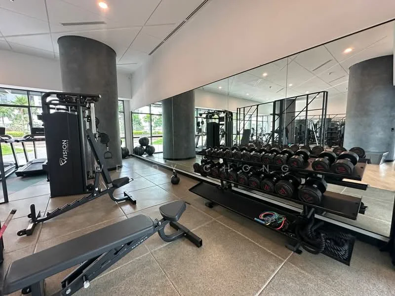 Gym features: weight bench, dumbbell rack with weights, cable machine, mirrored wall, large windows for natural light, grey tile flooring, black rubber flooring, exercise mats, fitness equipment, open layout; style: modern; view: garden.