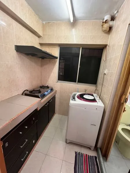 Kitchen features: ceramic tile flooring, light beige tiled walls, black cabinetry, stainless-steel sink, 2-burner gas hob, exhaust hood, window with view to outside, washing machine, countertop with storage, white appliances, textured wall panel, strip lighting; style: modern.