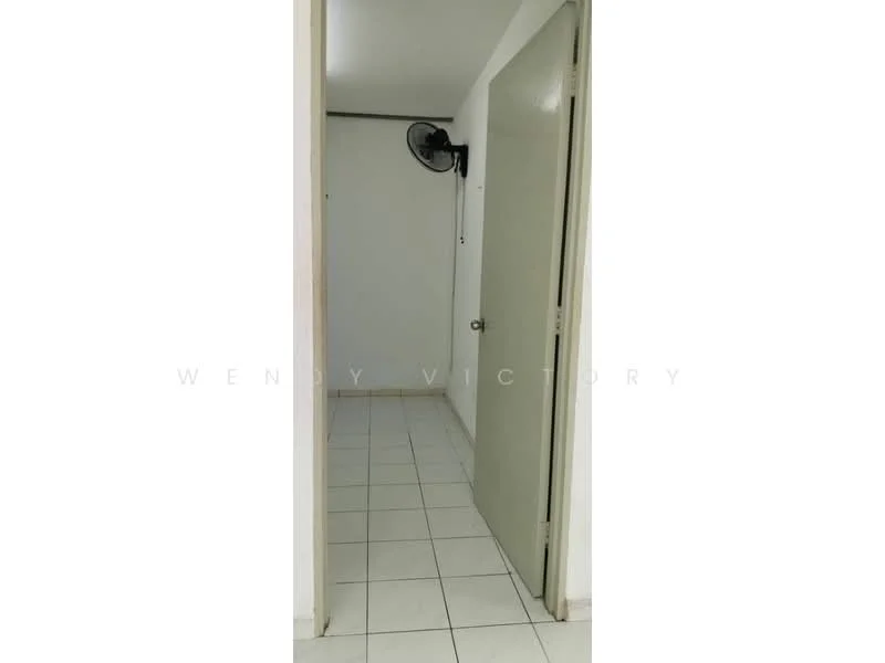 Room features: white painted walls, tile flooring, single door, wall-mounted ceiling fan.