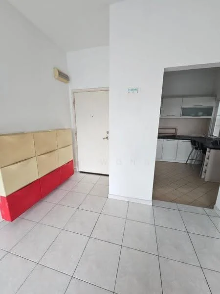 Room features: white painted walls, tile flooring, wooden cabinet with red and cream finish, main entrance door, open layout to kitchen area, visible kitchen cabinetry, neutral color scheme; style: modern.