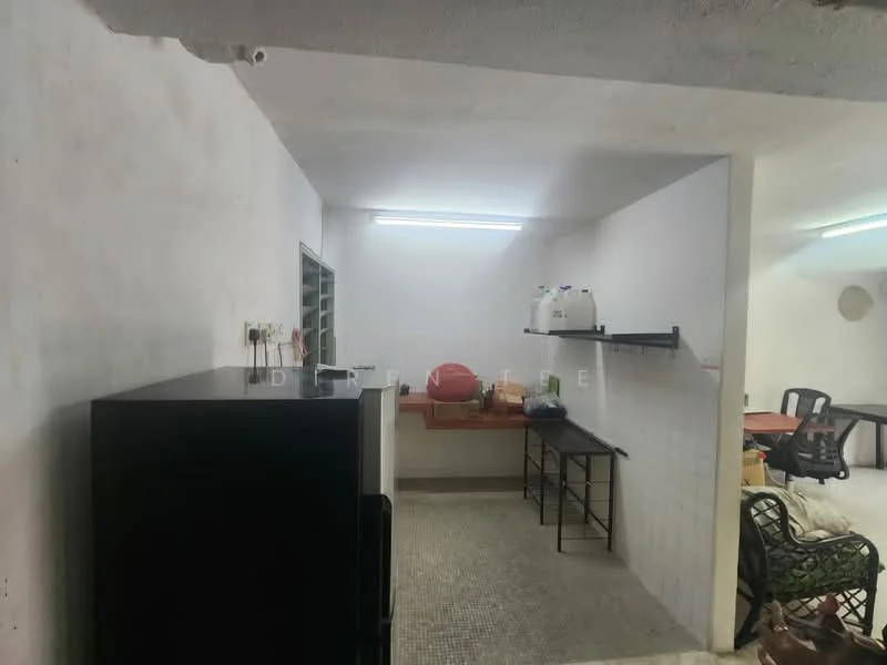 Laundry features: white painted walls, concrete flooring, refrigerator, black metal table, wooden countertop, sink, overhead fluorescent lighting.