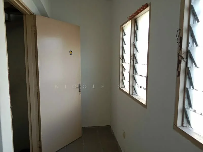 Room features: white painted walls, grey tiled flooring, single door, louvered windows, natural light from windows.